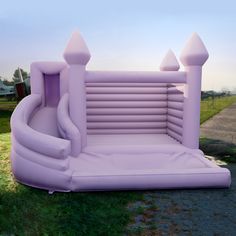 an inflatable bouncer is set up on the lawn