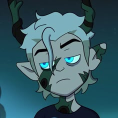 an animated character with blue eyes and horns on his head, staring at the camera