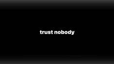 the words trust nobody written in white on a black background