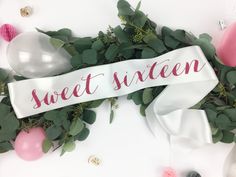 "Customize this premium satin sash with your own colors. PRODUCT INFO: - \"Sweet 16\" sash - For variations, please see our shop or send us a message! - 3.5\" wide (4\" if noted in selection tree) double face satin sash. - Sash is approximately 70\" long. (can be adjusted by request) -Comes rolled in a gift bag to give away, and to prevent creases during shipment - Open ended sash, Comes with an adhesive Velcro coin so you can customize the size of the sash as it hangs by your hip! SHIPPING INFO Bridesmaid Sash Bachelorette, Sweet 16 Sash, White Sash, Bachelorette Sash, Bride Jacket, Birthday Sash, Bride To Be Sash, Satin Sash, Custom Birthday