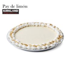 a white plate with gold trimmings on the edge and an inscription that reads pay de limoon kirkland