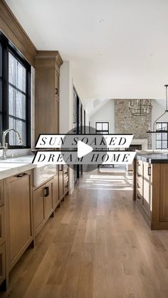 an open kitchen with wooden floors and white counter tops, along with the words stay naked drive home