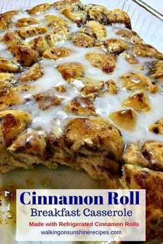 cinnamon roll breakfast casserole on a plate with the words cinnamon roll breakfast casserole