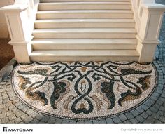 the steps are decorated with mosaic tiles