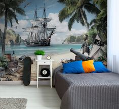 a bedroom with a pirate ship painted on the wall