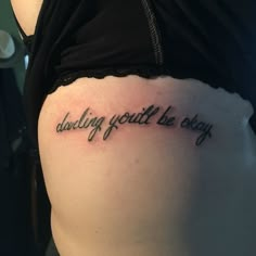 a woman's stomach with the words doing youll be okay tattooed on it