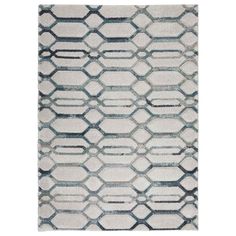 a white and blue rug with an abstract design