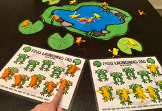 frog landing pad and matching game for kids to play with each other on the table