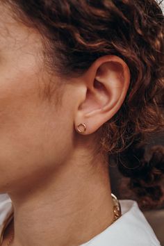 These earrings are simple, modern and beautiful. Try pairing them with the Twist Open Circle Studs! Choose a PAIR of studs or a SINGLE stud at checkout. The REGULAR size measures around 1/4″ in diameter.Each stud earring comes with an ear nut backing. Choose from 14K GOLD FILL, 14K ROSE GOLD FILL, or STERLING SILVER. Each Open Circle stud earring is individually shaped by hand for a beautiful hand-crafted, high-quality earring. First, we solder a small circle to an ear wire post. Then we polish Gold Circle Earrings, Rose Gold Circle, Simple Gold Earrings, Circle Stud Earrings, Mini Twists, Twisted Metal, Circle Earrings Studs, Earrings Simple, Circle Studs