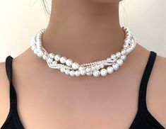 Elegant multi layers and sizes white shell pearl necklace choker. A fantastic gift for any occasion!  Handmade with high quality white tone shell pearl beads. Pearl sizes are 3mm, 6mm and 10mm.  The design is highly versatile to match your style. You can use it as double strand choker necklace, or just the 14mm pearl necklace only. The necklace features an easy to use spring ring clasp, and comes in a lovely jewellery gift box.  All our necklaces are completely handmade, and we can customize the colours and sizes for you. Elegant White Pearl Charm Choker, Elegant White Choker With Pearl Charm, White Pearl Drop Choker Jewelry, White Pearl Choker Jewelry, Elegant White Choker With Pearl Drop, Elegant White Pearl Drop Choker, White Pearl Charm Choker For Party, Elegant White Pearl Choker, White Pearl Pendant Choker Necklace