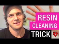 a man is holding his hand up in front of him with the words resin cleaning trick