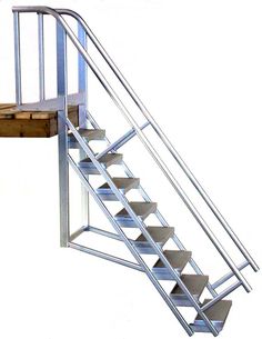 a set of metal stairs with handrails and steps on each side, against a white background