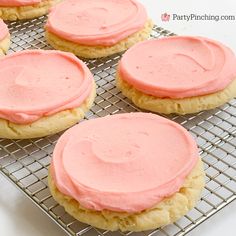 pink sugar cookies on a cooling rack with the words best copycat crumbl