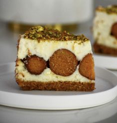 two pieces of cake sitting on top of a white plate