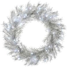 a wreath made out of silver tinsel on a white background with clippings