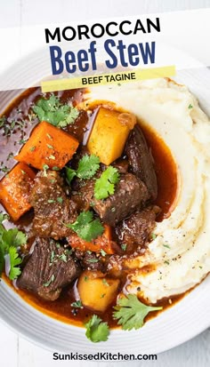 beef stew with mashed potatoes and parsley in a white bowl