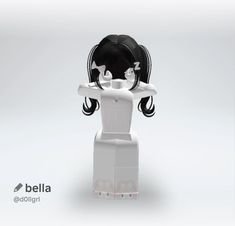 a white and black doll with long hair