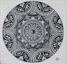 a black and white drawing of a circular design