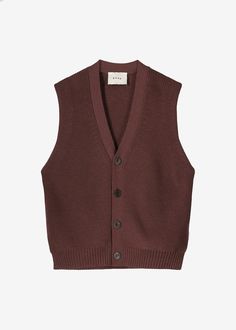 Color: Prugna Responsibly sourced virgin wool Produced by a small family-owned Italian knitwear supplier Rib knit Oversized fit V-neckline Sleeveless vest Straight hem Front button closure 100% Virgin Wool Hand Wash Only By Róhe. Made in Italy Classic Wool V-neck Sweater Vest, Brown Knit V-neck Vest, Brown Wool Sweater Vest For Workwear, Casual Merino Wool Sleeveless Sweater Vest, Wool V-neck Sweater Vest For Winter, Wool V-neck Vest For Layering, Casual Sleeveless Merino Wool Vest, Wool Knitted V-neck Top, Knitted Wool V-neck Tops