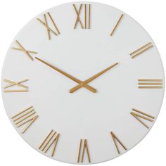 a white clock with gold roman numerals