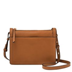 PRICES MAY VARY. Editor's Notes: Taryn is an everyday style in a perfect size. The simple styling details make it versatile to wear with casual and refined looks. It features an adjustable crossbody strap and has exterior function with its front and back slide pockets. Perfectly Proportioned: 9.5" L x 2.25" W x 7.25" H; 1 Adjustable Crossbody Strap Premium Craftsmanship: Genuine Leather Crossbody Bag; Zipper Closure; Fabric Lining; imported It's all in the Details: Exterior Details: 1 Back Slide Classic Fashion Pieces, Brown Shoulder Bag, Samsung Galaxy S22, Leather Products, Leather Crossbody Purse, Crossbody Purse, Everyday Style, Crossbody Strap, Leather Working