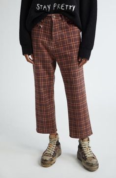 Chris Leba's rebellious vision breaks through in the rock 'n' roll–inspired silhouette of these cropped pants patterned in autumnal-hued plaid. Zip fly with button closure Five-pocket style 98% cotton, 2% polyurethane Machine wash, line dry Imported Designer Clothing Plaid Tuxedo, Tuxedo Pants, Pants Pattern, Auburn, Straight Leg Pants, Cropped Pants, Bottoms Pants, The Rock, Leg Pants