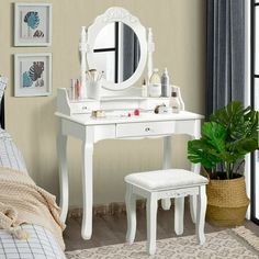 a bedroom with a white vanity and stool