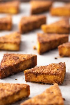 several pieces of food sitting on top of a baking sheet