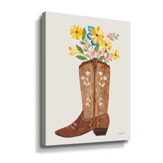 a painting of a cowboy boot with flowers in it on a white background framed canvas