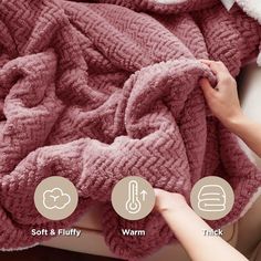 a person is holding a pink blanket on top of a couch with the words, soft & fluffy warm and thick