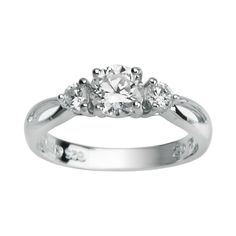 a white gold ring with three diamonds on the top and side stones in the middle