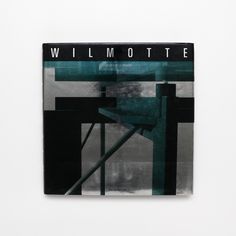 a black and white photo with the words wilmotte on it's cover