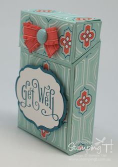 a small box with a bow on the top and words get well written on it