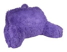 a purple stuffed animal laying on top of a white background