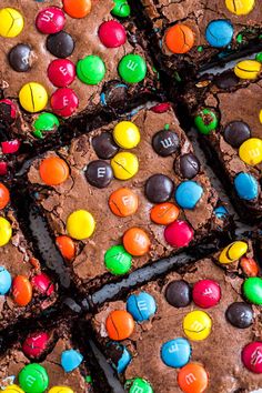 there are many brownies with m & m candies on them