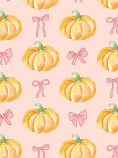 watercolor pumpkins with bows on pink background