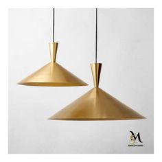 two brass colored pendant lights hanging from the ceiling, one light is turned on and the other is off