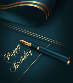 a happy birthday card with a fountain pen and gold lettering on a dark blue background