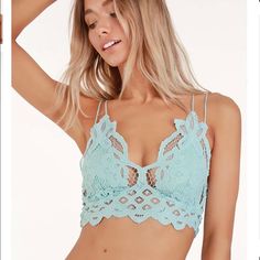 Nwot! Intimately Fp Adella Longline Bralette In Light Blue ~Size: S~ Add A Little Sweetness To Your Day With The Free People Adella Light Blue Lace Bralette! Romantic, Airy Crochet Lace Partially Lined Triangle Cups Double, Adjustable Skinny Crisscrossing Straps Smocked, Elasticized Back Pull-On Design 60% Cotton, 40% Nylon Light Blue/Green Color New Without Tags! Never Worn, In Perfect Condition. Summer Bra With Lace Trim And Spaghetti Straps, Delicate Lace Underwire Bra For Summer, Spring Camisole Bra With Delicate Lace, Beach Lace Stretch Bra, Stretch Lace Beach Bra, Summer Lace Camisole Bra, Beach Stretch Lace Bra, Summer Bra With Delicate Lace And Spaghetti Straps, Spring Lace Bra With Delicate Straps