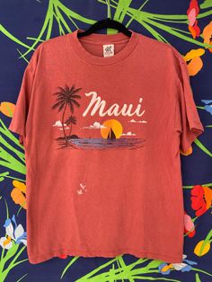 Vintage 80s single stitch t-shirt from Maui / surfer shirt from hawaii  Size: L Brand: Attitude Condition: minor stain on front other than that great We can do a deal through PayPal or Venmo to save money on etsy fees Location Graphic, Florida Shirts, Beach Tees, Hawaii Tshirt, 90s Culture, Surfer Shirt, Florida Shirt, Beach Tee, Vintage Hawaii