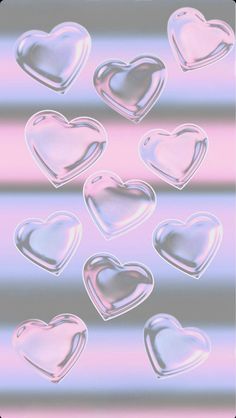 several hearts are shown on a pink and blue background