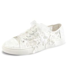 a white shoe with flowers on it