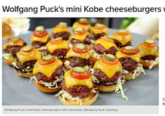 mini hamburger sliders with cheese and toppings on a gray plate, ready to be eaten