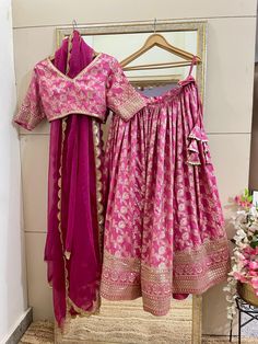 This is a Custom made Lehenga Choli dupatta.  I make it exclusively for my customers by using designer fabrics. I will only make it after you confirm your required size details. Handling time: Don't worry, just tell me, I will process it accordingly and deliver on or before a delivery date you mention. Size: This is custom made as per your size. This is not available in plus size. Post your order I will send you a measuremnts reference sheet using which you can provide details required to make your outfit. Fabric and work: Lehnga made in Embroidered silk Banarasi  fabric. Blouse is in heavy embroidered silk Dupatta is in Net with embroidery lace border on all sides of it. Dupatta is decorated with beautiful Sequine work all over as shown in the picture. Wedding Dress With Pallu In Brocade, Semi-stitched Brocade Dresses For Wedding, Semi-stitched Brocade Wedding Dresses, Brocade Sets With Gota Work For Reception, Reception Brocade Sets With Gota Work, Wedding Gown With Dupatta In Brocade, Anarkali Brocade Wedding Set, Anarkali Banarasi Silk Wedding Gown, Wedding Anarkali Banarasi Silk Gown