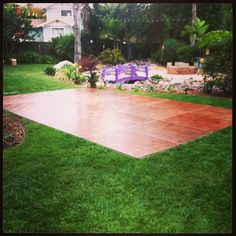 an empty dance floor in the middle of a yard