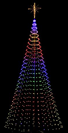 a large christmas tree is lit up with multicolored lights