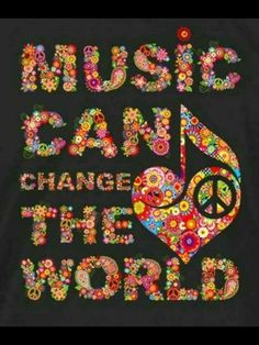 the words music can change the world on a black t - shirt with colorful flowers