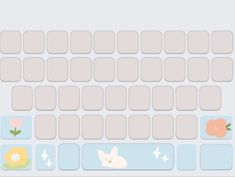 an image of a computer keyboard with flowers and animals on the keyshells in pastel colors