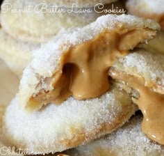 some powdered sugar cookies with peanut butter on top