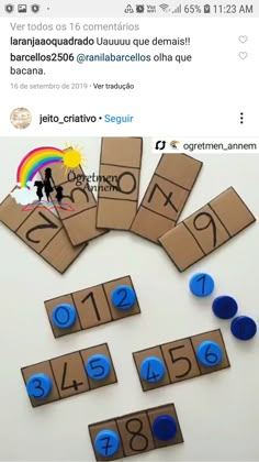 the numbers are arranged on cardboard with blue circles in front of them and one is missing